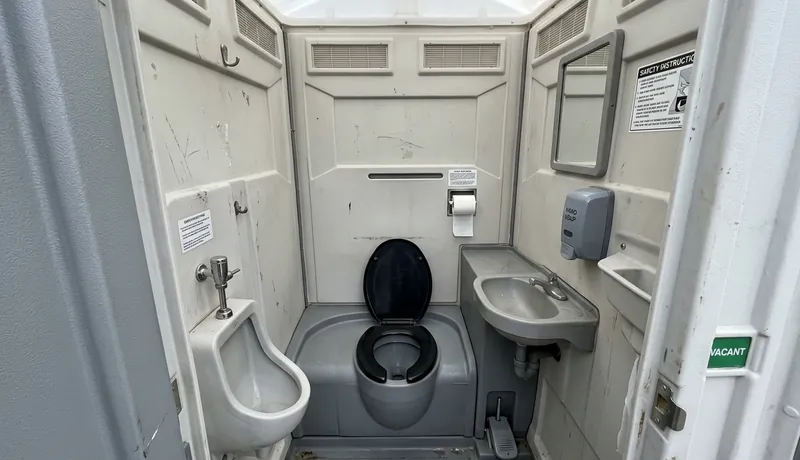 Deluxe Porta Potty (with Flushing) event setup in Houston, TX